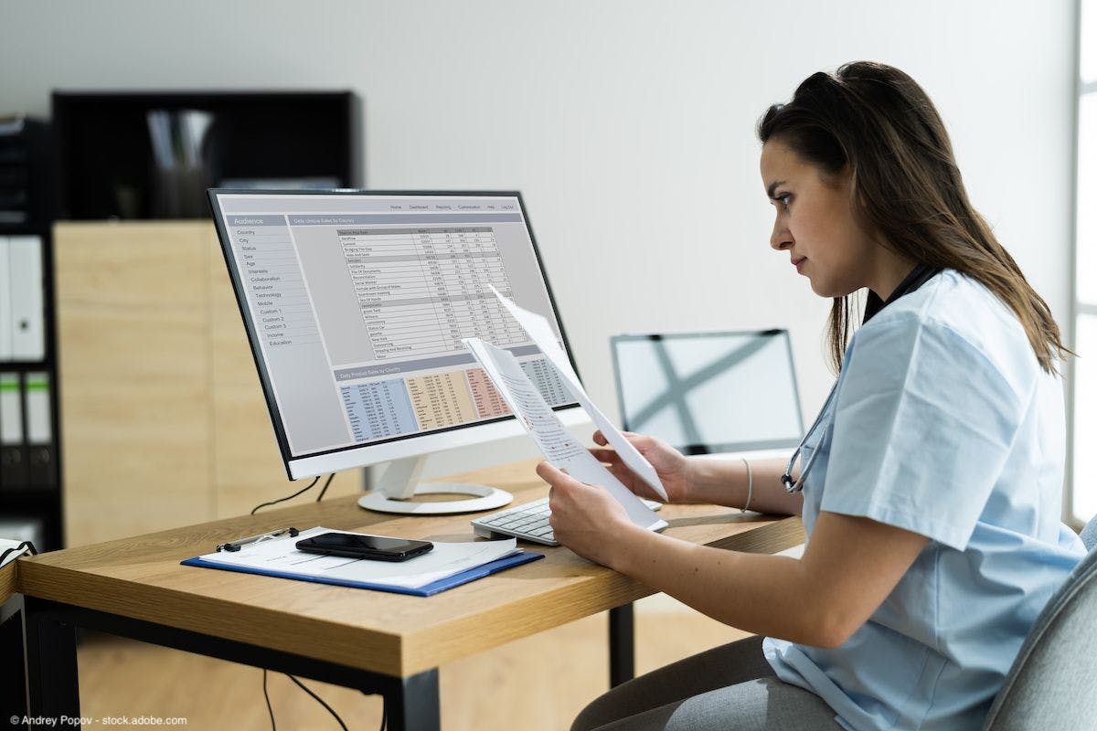 Female doctor working with documents | Image Credit: © Andrey Popov - stock.adobe.com