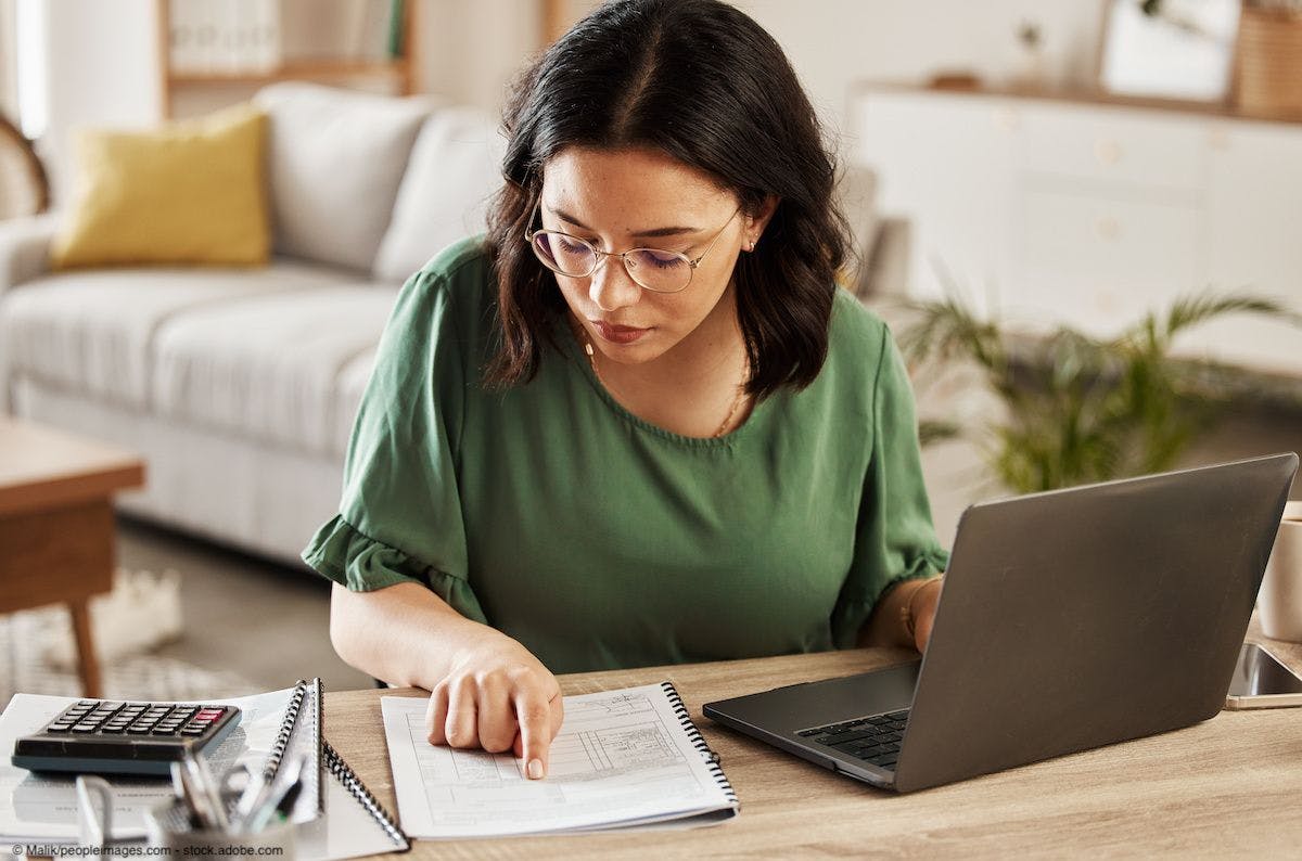 Woman working on finances | Image Credit: © Malik/peopleimages.com - stock.adobe.com 